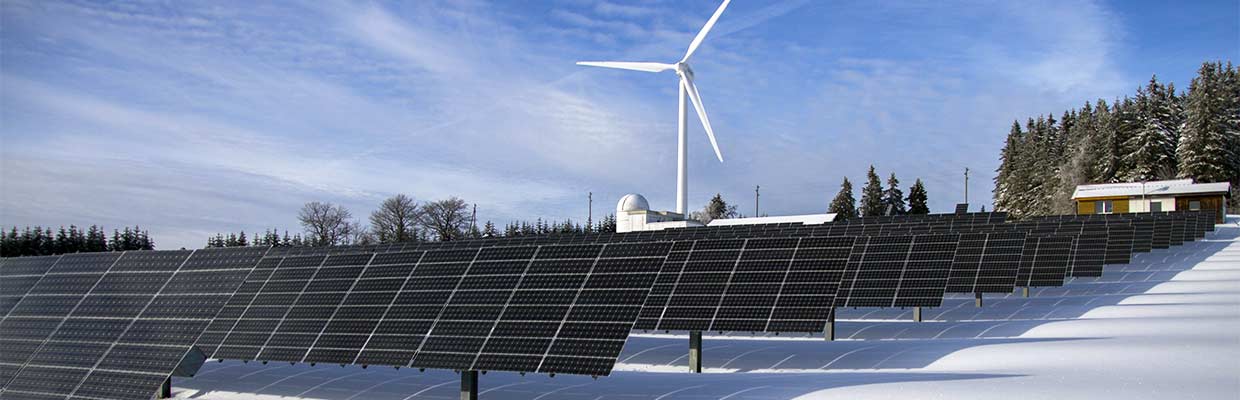 MP Power Services page header - solar panels and wind turbine on snowy hillside